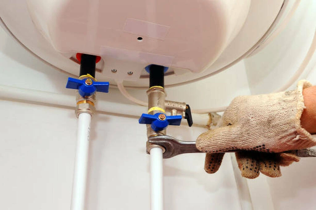 Plumber checking for gas pipe leaks with sensitive sensors